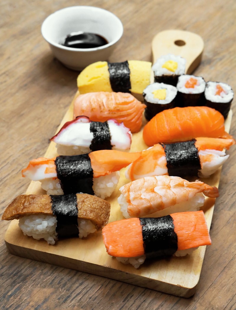 Fresh sashimi assortment with tuna and salmon at sushi bar